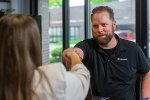 Ted Shaking Sarah's Hand